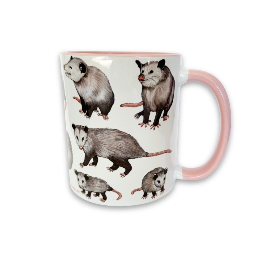 Mug with opossum illustrations on a white background