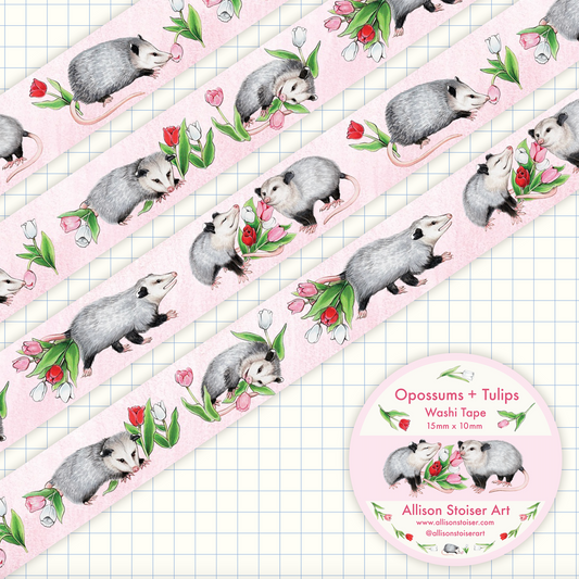 Washi tape with opossums and tulips design on a grid background.