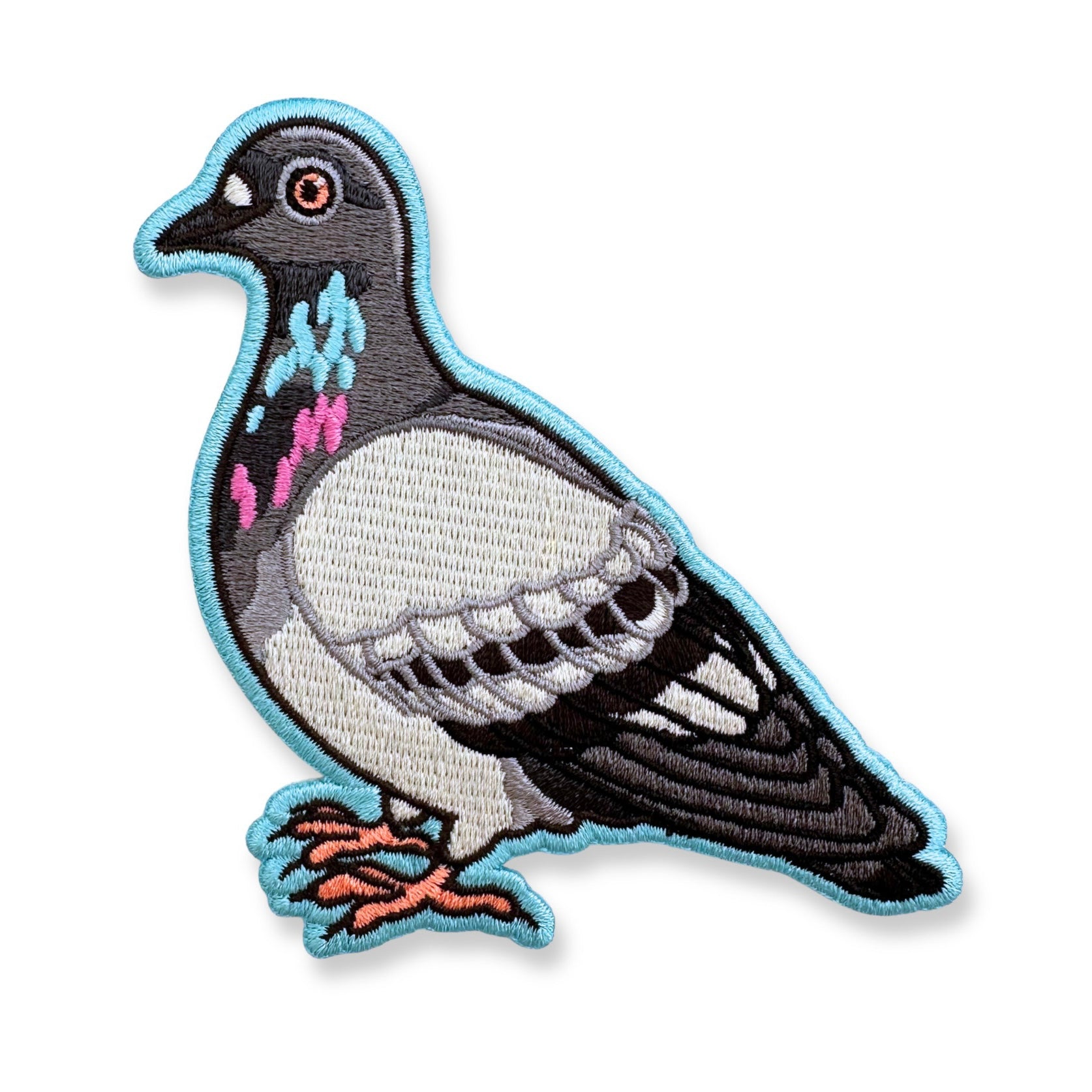 Embroidered patch of a pigeon on a white background