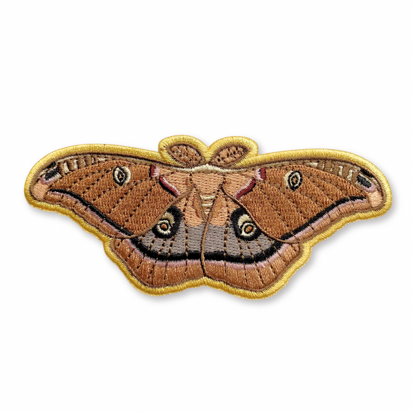Embroidered patch of a Polyphemus moth on a white background