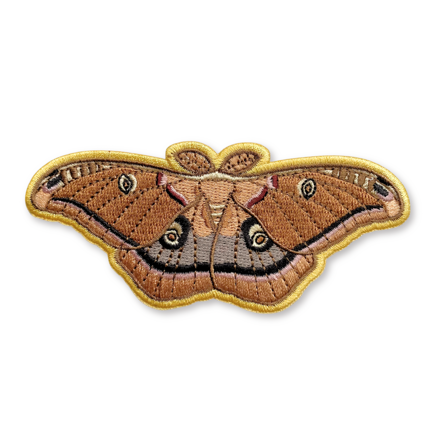 Embroidered patch of a Polyphemus moth on a white background