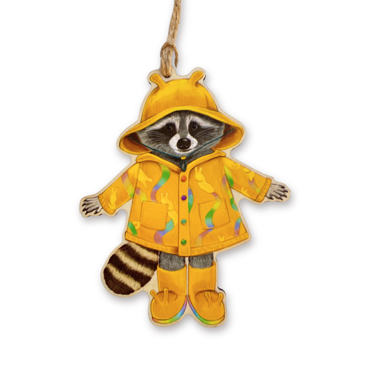 Raccoon ornament wearing a yellow raincoat with colorful slug accents on a white background