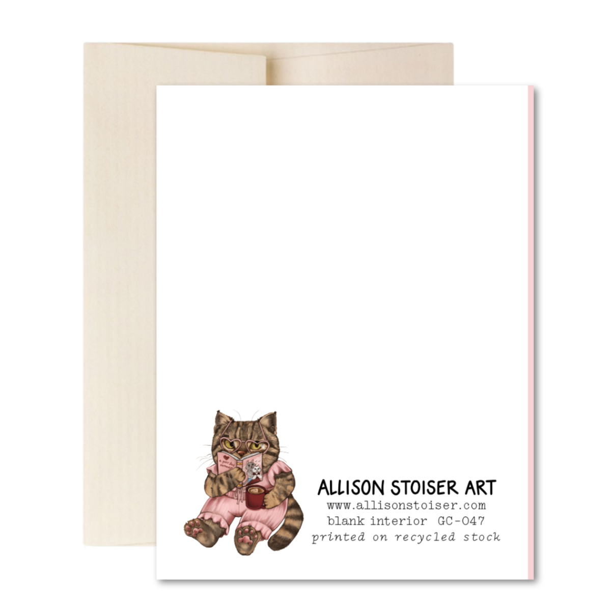 The back of a greeting card featuring a cat reading a romance novel