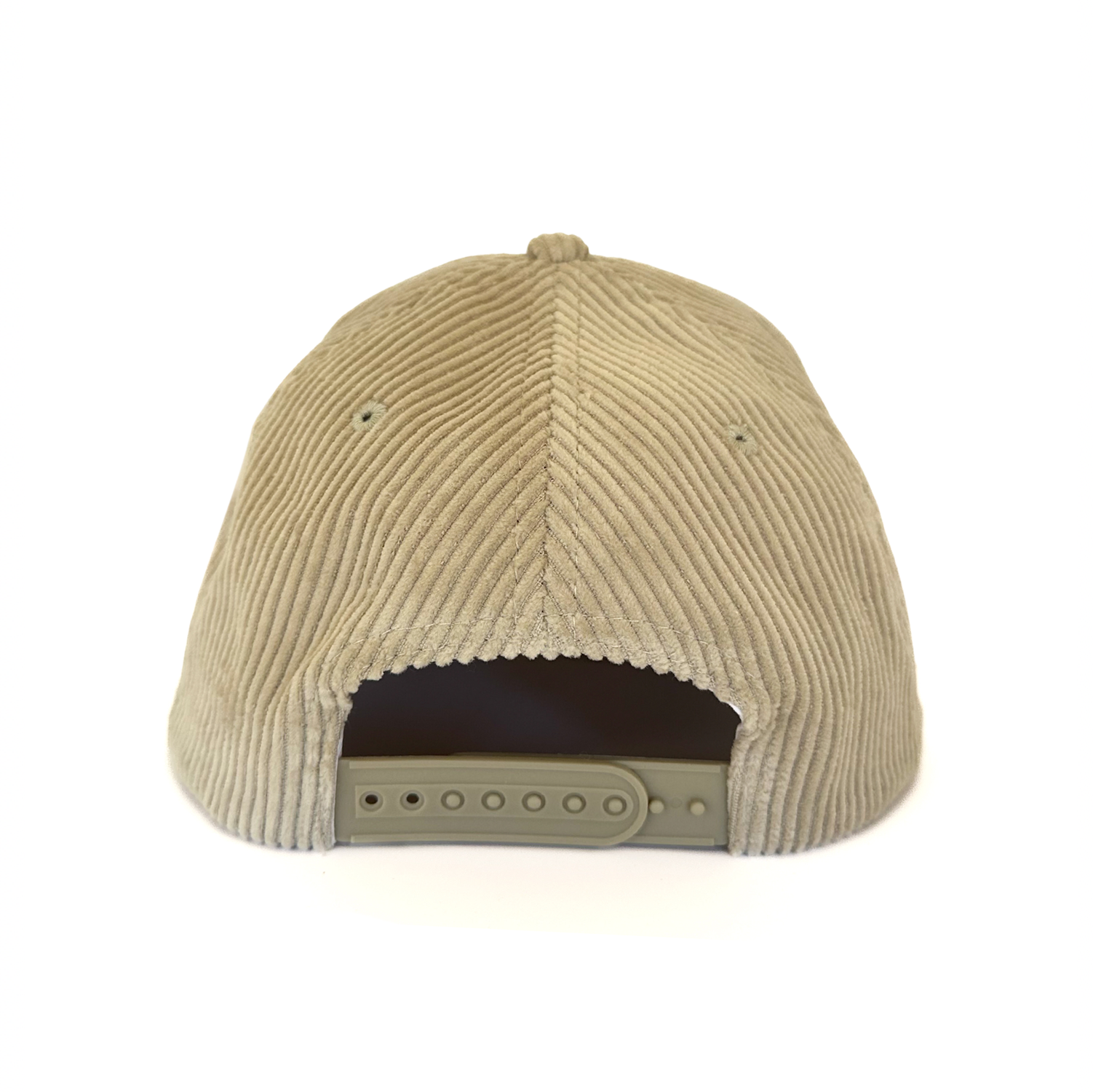 Beige corduroy cap on a white background