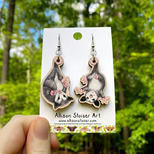Wooden earrings with baby opossum charms