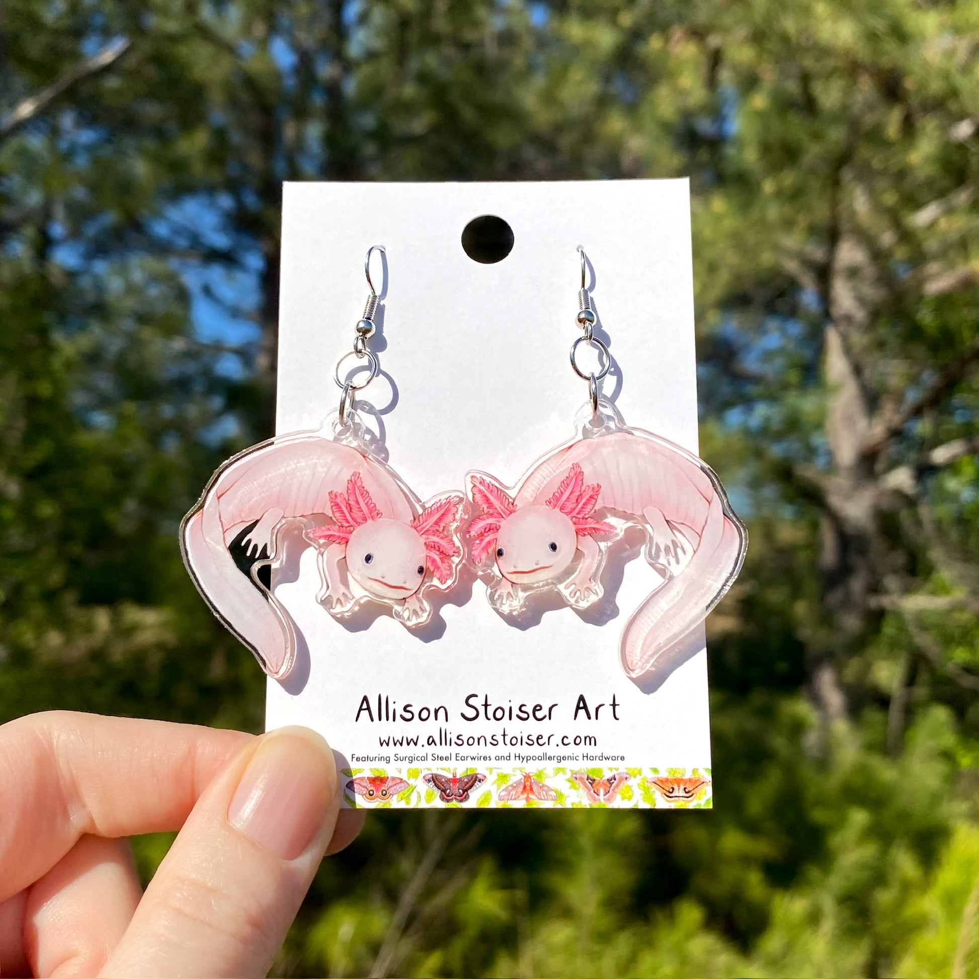 acrylic earrings with axolotl charms
