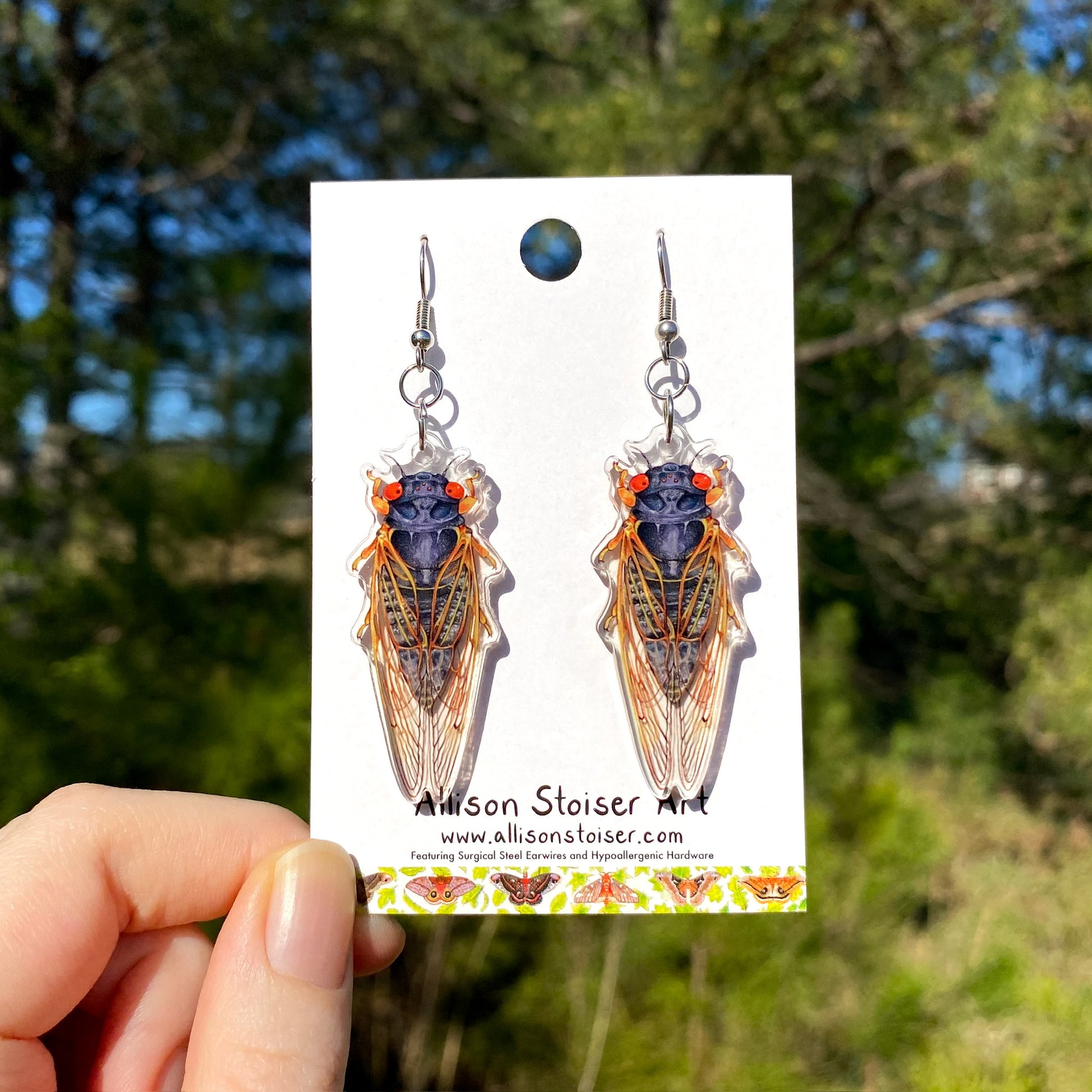 acrylic earrings with periodical cicada charms