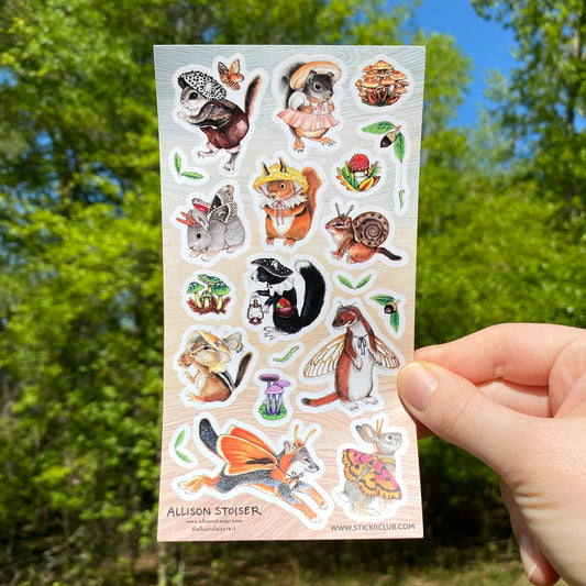 a sticker sheet with various woodland animals in mushroom hats and with insect wings.