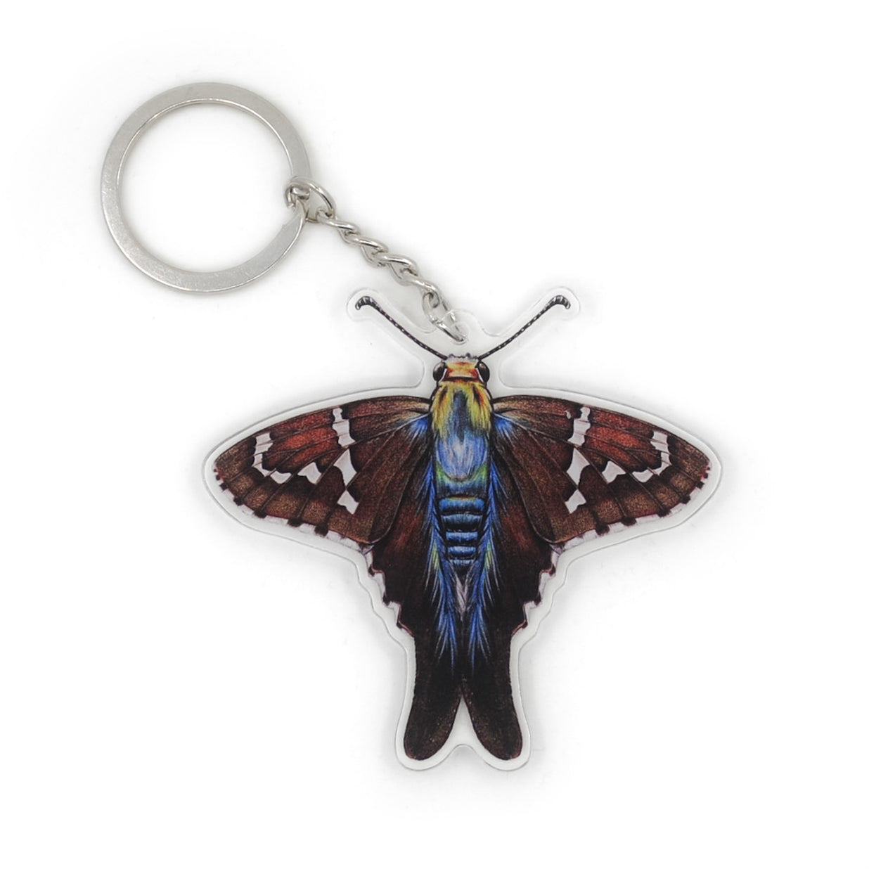 A keychain of a long-tailed skipper butterfly on a white background.