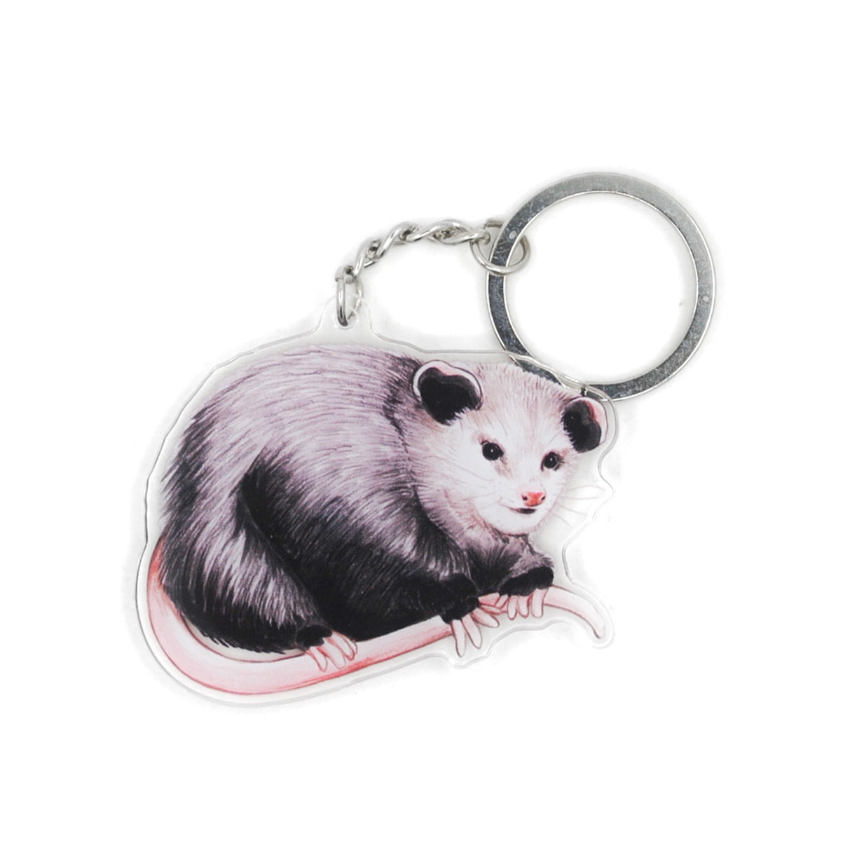 A keychain of a Virginia opossum on a white background.