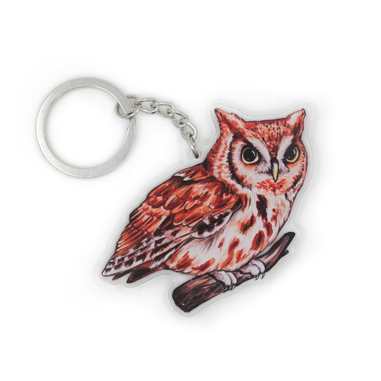 A keychain of an eastern screech owl on a white background.