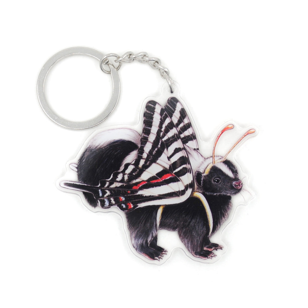 A keychain of a striped skunk in a zebra swallowtail costume on a white background.