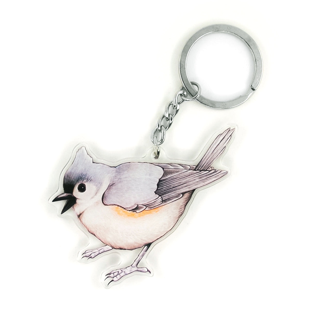 A keychain of a tufted titmouse on a white background.