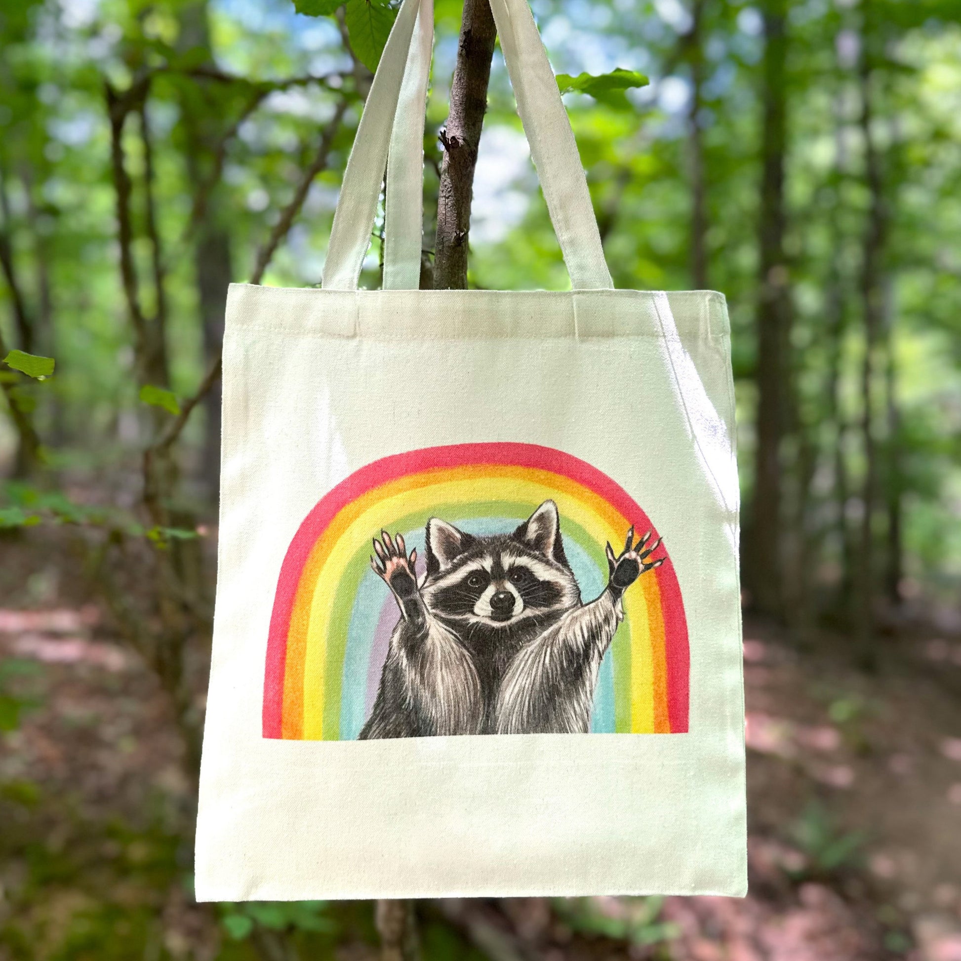 A totebag featuring an illustration of rainbow insects