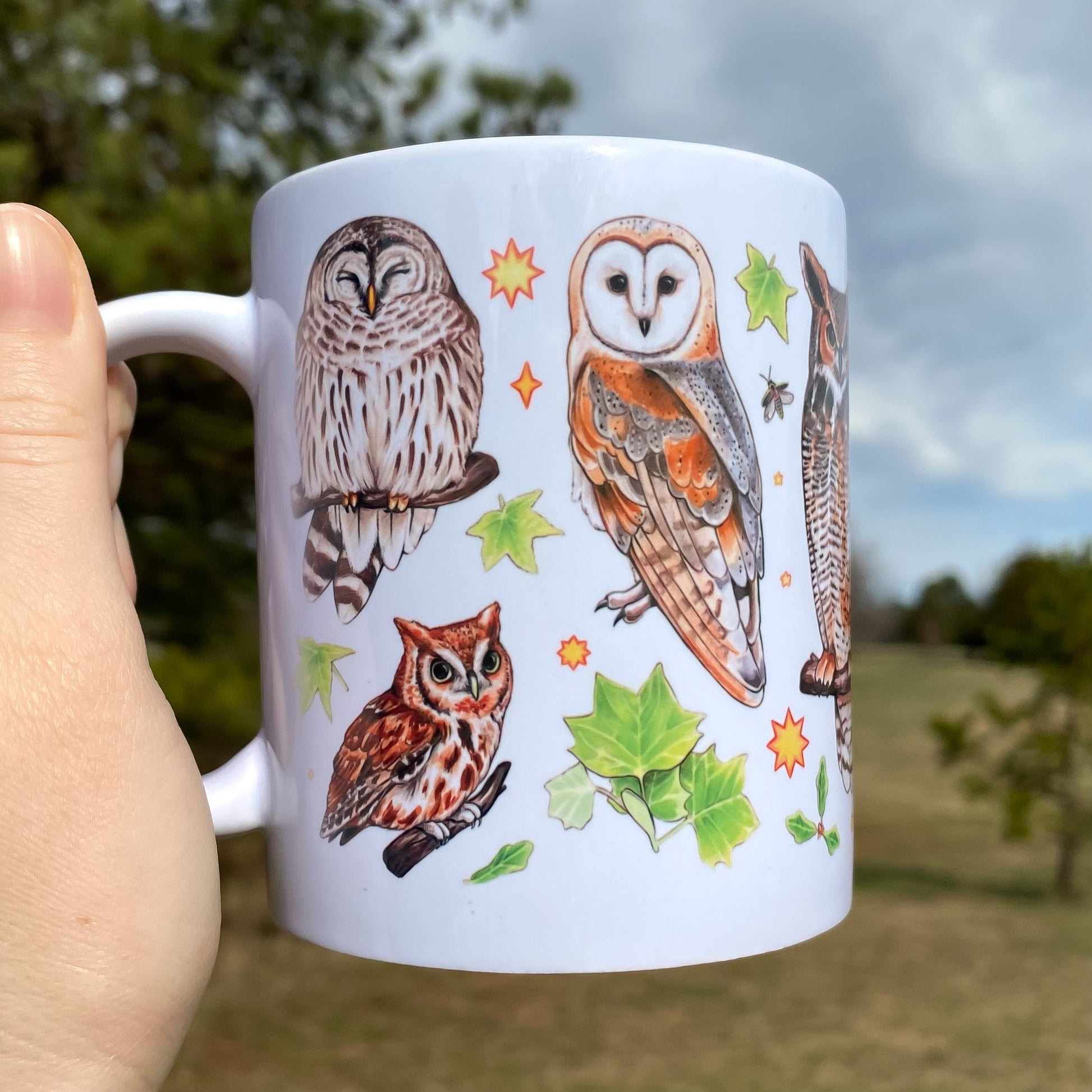 A mug featuring owls of the eastern united states