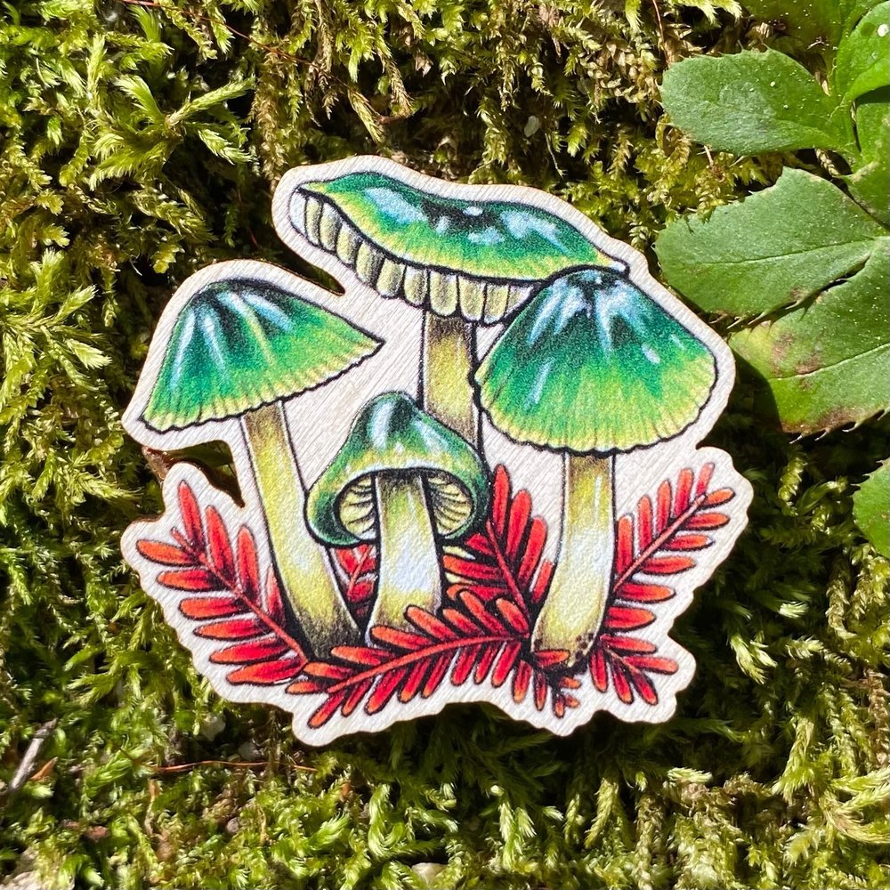 A sustainably sourced pin featuring an illustration of a parrot waxcap mushroom